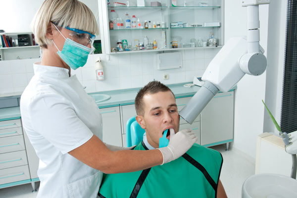 Рентген зубов: разновидности и вред для организма