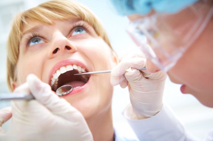 Болят все зубы сразу: что это, как лечить?